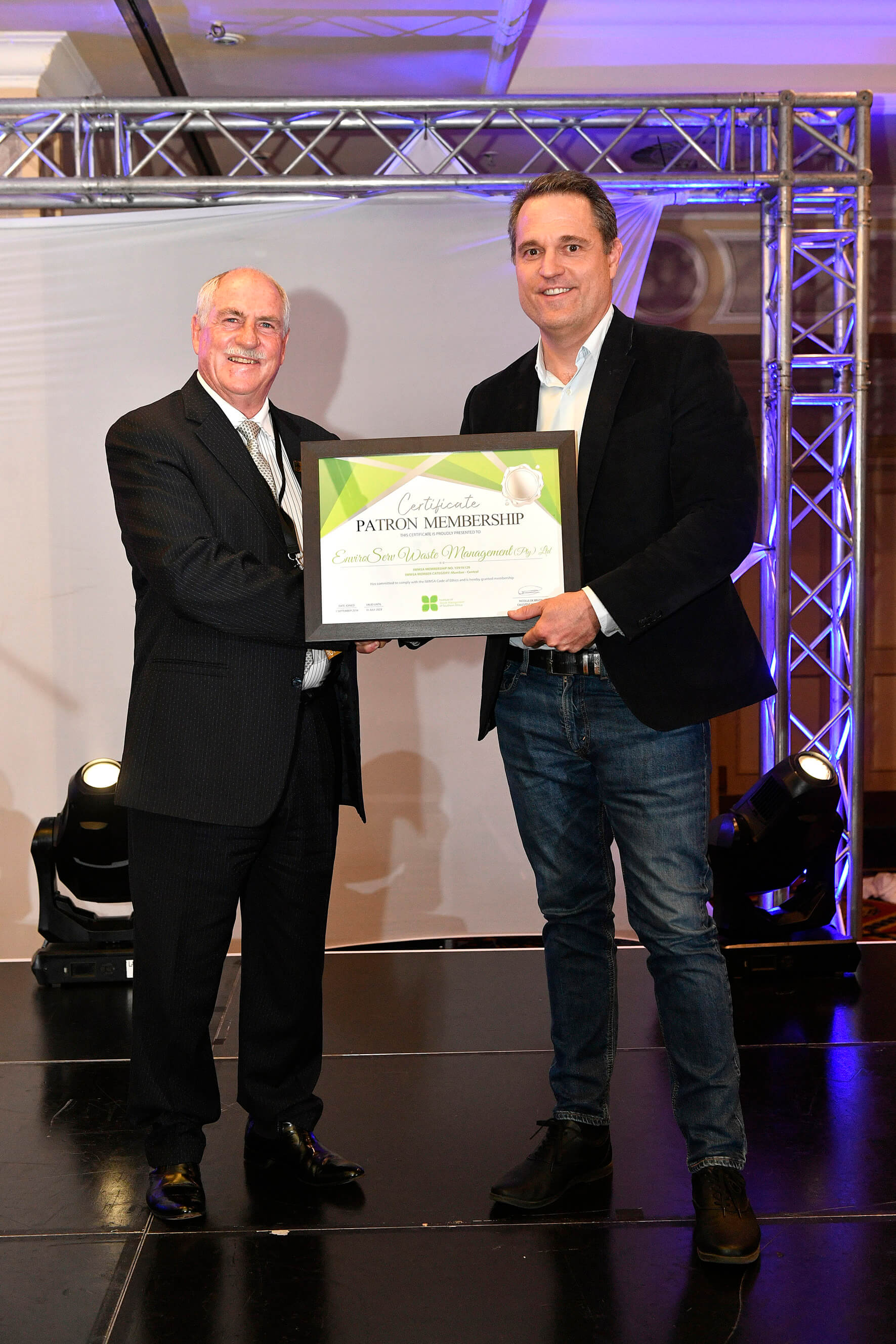 Dean Thompson receiving EnviroServ's Patron membership 